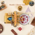 Mini arti pooja machine with blue drum and nandi trishool and shivaling painted on it